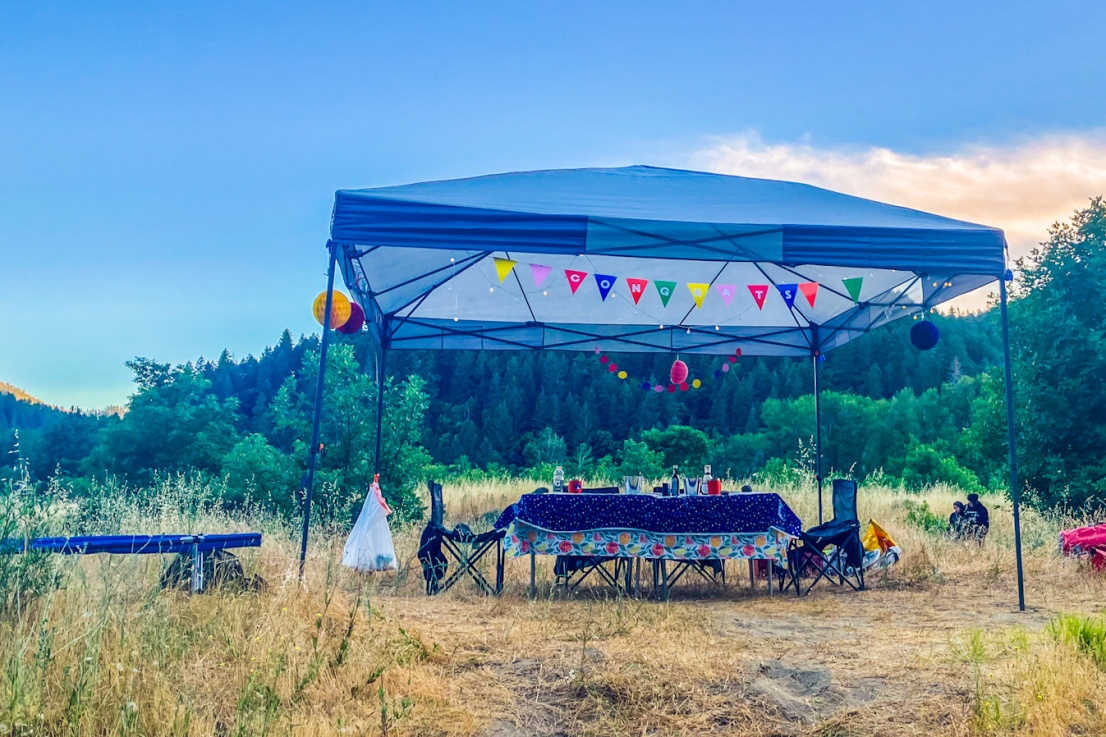 camp set up for a celebration next to the Rogue River 