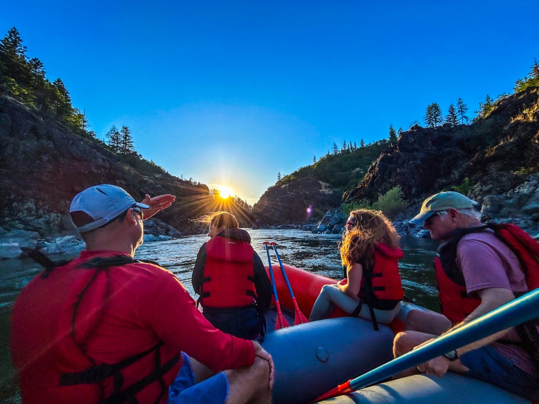 Sun setting over rafters on the Rogue River