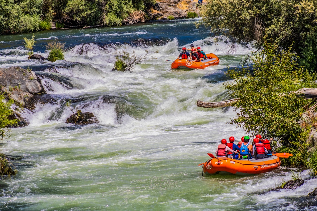 Looking upstream at two rafts in Tilomikh Falls on the Rogue River